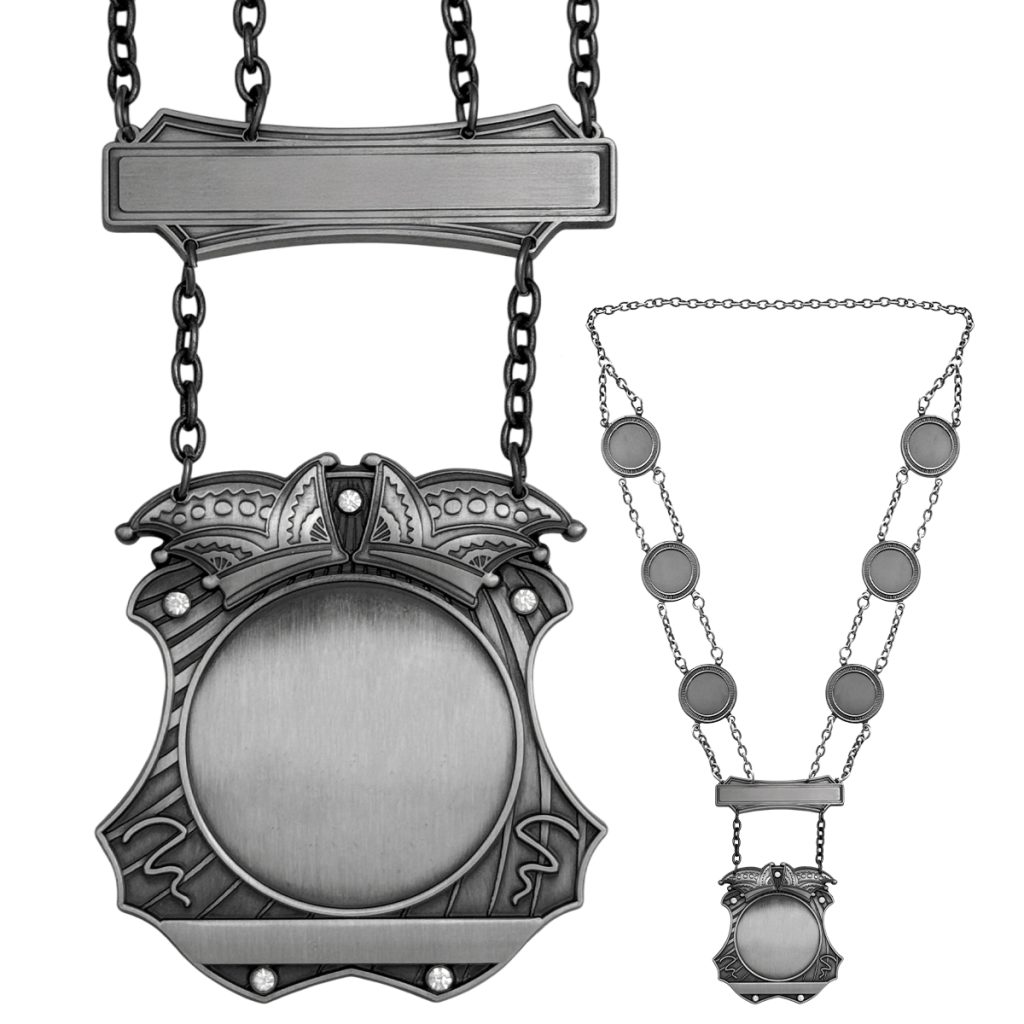 Prinsenketting B in antiek zilveren uitvoering. Inclusief 6 schakels en gravure balkje. Ruimte voor gravure op twee plaatsen. Voorzien van full colour afslag.